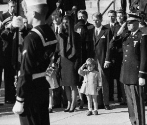 [Image: JFK-JR-Salute-1963-300x255.jpg]